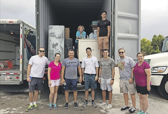 Members of the Lend A Hand Bahamas team, who loaded up a 40-foot shipping container to send to The Bahamas. 