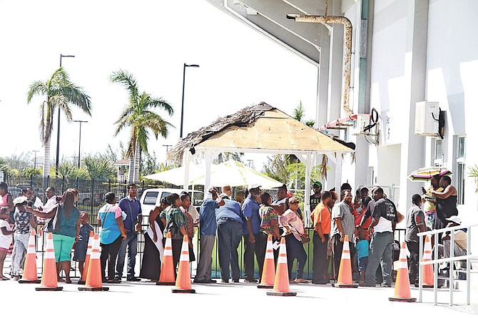 Long lines on Friday at the national stadium - the Road Traffic Department's temporary location.
