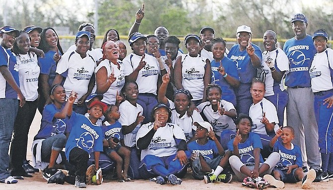 WE ARE THE CHAMPIONS: The Johnson’s Lady Truckers celebrate after winning the New Providence Softball Association ladies’ championship title.                                         