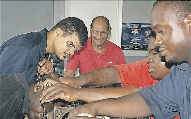 Students at an auto mechanics class at the Bahamas Technical and Vocational Institute.