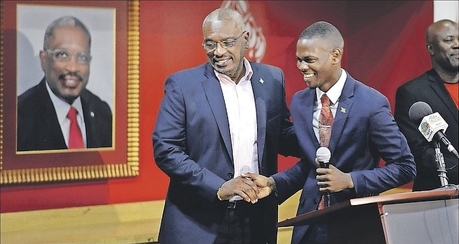 Dr. Hubert Minnis, Leader of the FNM pictured with their new ratified candidate for Bain and Grants Town, Travis Robinson. Photos Shawn Hanna