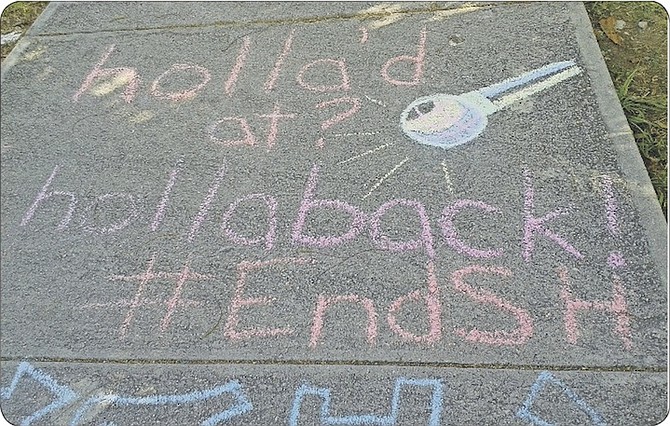 Students help shine a light on social issues during previous chalk art events.