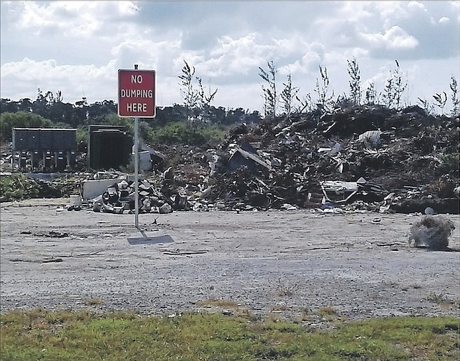 The scene behind the National Sports Centre yesterday where hurricane detritus has been dumped. 

Photo: Valden Fernander
