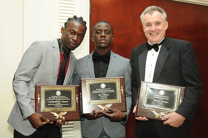From left, Lamech Johnson holding his award for political journalism, photographer Shawn Hanna holding the award won by The Tribune for newspaper design, and managing editor David Chappell with the award for website of the year. 
Photo: Franklyn Ferguson