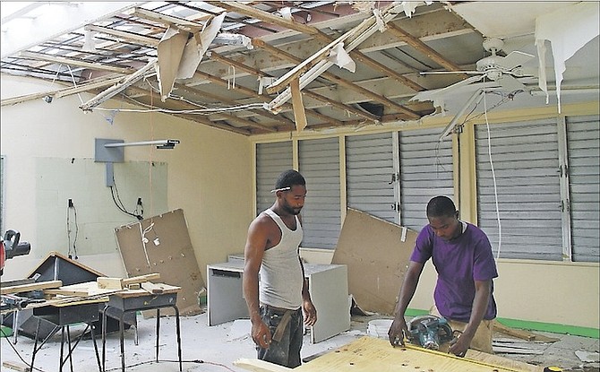Repairs in the CI Gibson government school after Hurricane Matthew. Photo: Tim Clarke/Tribune Staff