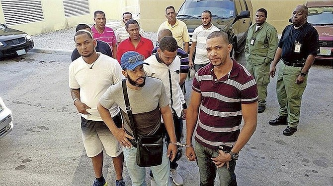 The group of 11 Domincan nationals who appeared at court in Freeport yesterday.