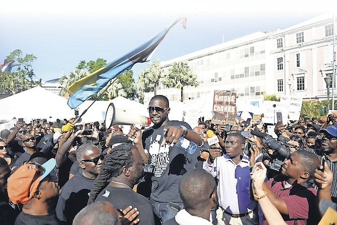 “We March” organiser Ranard Henfield addresses the crowd at the Black Friday march in Rawson Square. Photo/Shawn Hanna