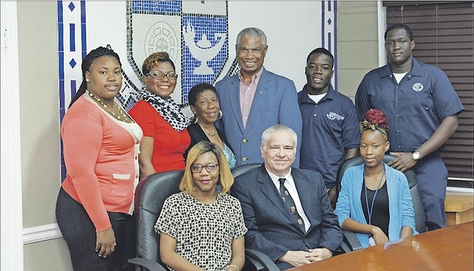 Pictured seated (from left to right) are scholarship recipients Annfernique Stubbs (seated left), Kiana Brown (seated right) and Kentone Brown (standing, second from right) with BTVI president, Dr Robert W Robertson, BTVI’s Associate Vice President of Fund Development, Alicia Thompson and Cat Island Sailing Association exectives Aliea Rolle, Andrea Sturrup and Pat Strachan. Standing far right is Arley Merzius, a 2014 scholarship recipient. Photo: Aaron Davis
