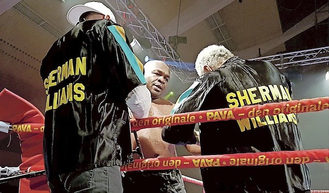 SHERMAN WILLIAMS assisted in his corner during the fight.