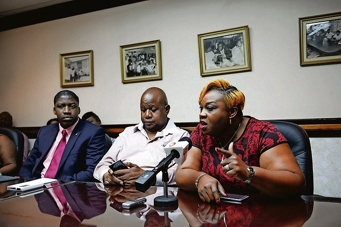 Nicole Martin, right, president of the BHCAWU, speaking at the National Congress of Trade Unions Bahamas (NCTUB) press conference yesterday to address the recent layoffs at the One&Only Ocean Club. Photo: Shawn Hanna/Tribune Staff