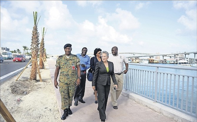 Glenys Hanna-Martin, Minister of Transport and Aviation, tours Potter’s Cay dock on Tuesday.
Photo: Shawn Hanna/Tribune Staff