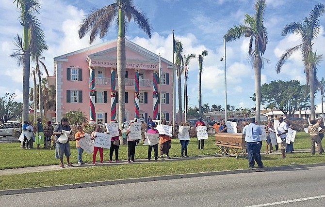 The Pinder’s Point Lewis Yard Environmental Committee and residents staged a protest on Tuesday at the Grand Bahama Port Authority’s headquarters in Freeport.

