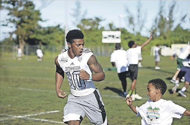 Dozens of students, from kindergarten to high school players, took part in various drills by USA Football staff players during the Youth Football Leadership Clinic at the Roscow Davies Soccer Field.  
Photo: Shawn Hanna/The Tribune