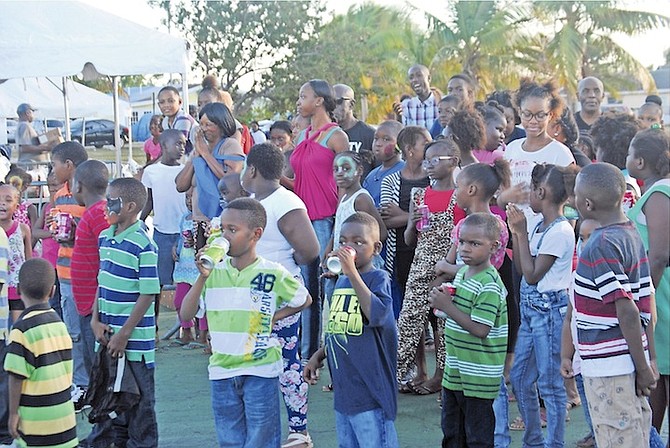 Some of those gathered at the party in Pinewood Gardens hosted by constituency MP Khaalis Rolle. Photo: Felicity Ingraham