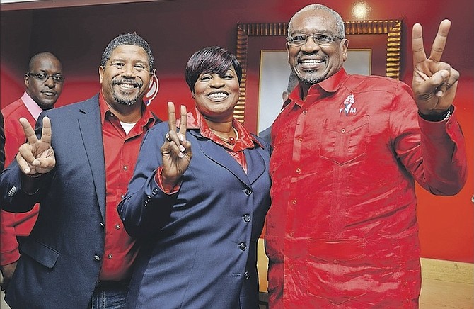 FNM candidate for Mical Pastor Miriam Reckley-Emmanuel flanked by FNM deputy leader Peter Turnquest and FNM leader Dr Hubert Minnis. Photo: Shawn Hanna/Tribune Staff