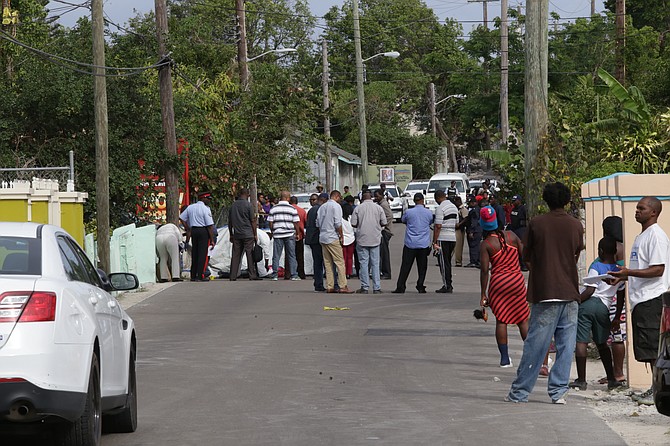 The scene at Kemp Road on Saturday morning, where a man was shot dead. Photo: Terrel W Carey/Tribune Staff