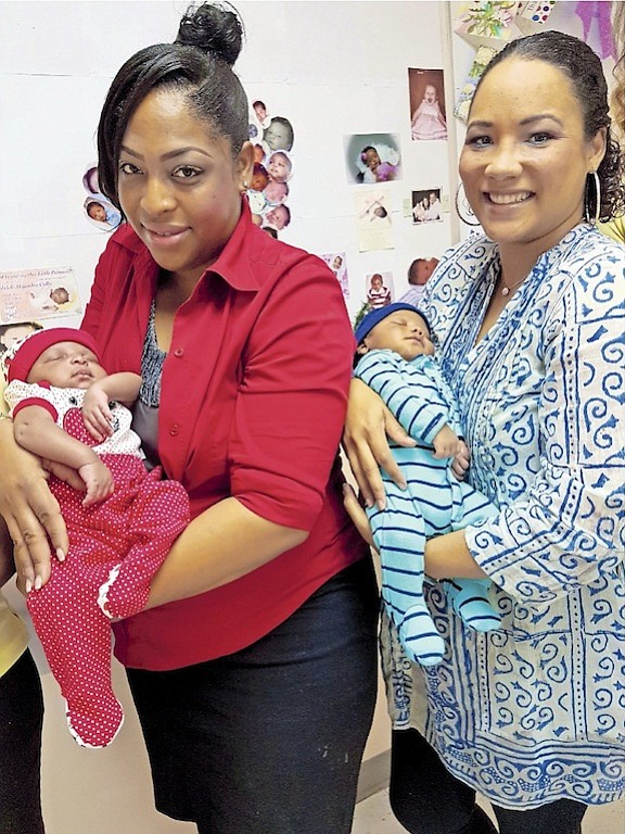 Proud mothers Kamia Rolle and Leah Treco holding their babies – Kyla Rolle was the first girl and Landon Treco the first boy born at Doctors Hospital in 2017.
