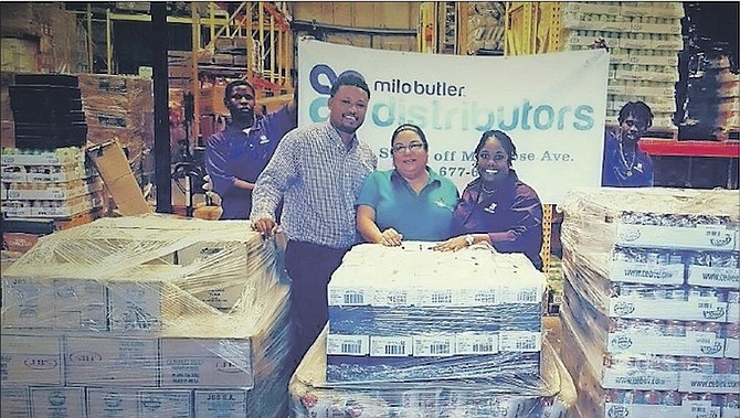 Milo Butler Distributors teamed up with Bahamas Red Cross to send supplies to islands impacted by Hurricane Matthew, with brand managers Jamarl Chea and Margo Gibson from the grocer.