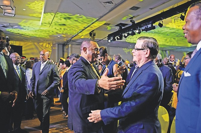 Prime Minister Perry Christie with Edison Key at the PLP convention earlier this year.