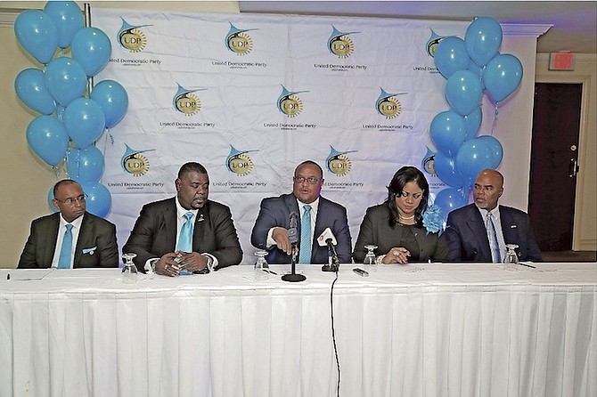 The United Democratic Party held a press conference in the Hilton hotel yesterday to announce candidates for the upcoming election. From left, Edmund Russell, Central Grand Bahama; deputy leader John Pinder, Fox Hill; party leader Greg Moss, Marco City; Margo Burrows, Yamacraw; and C Allen Johnson, the party’s national chairman. Photo: Terrel W. Carey/Tribune Staff