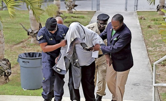A juvenile was arraigned at Magistrates Court yesterday for firearm possession. Photo: Terrel W. Carey/Tribune Staff