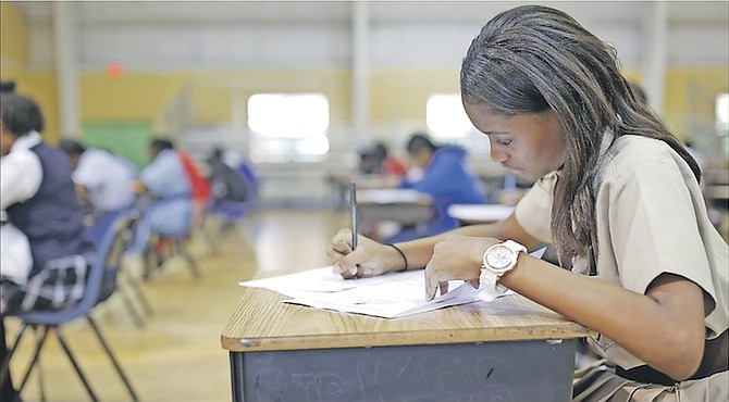 The official launch of the first essay writing competition headed by former British High Commissioner Peter Young. The competition was held at Anatol Rodgers High School and included students from government sectors and private. Photos: Terrel W. Carey/Tribune Staff