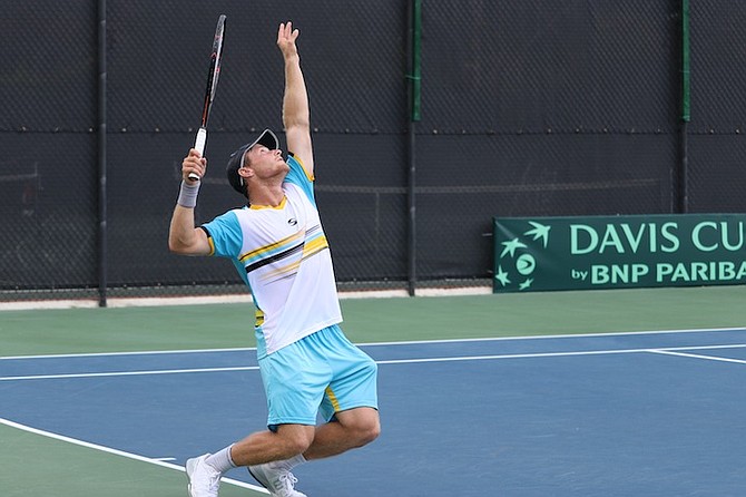 Spencer Newman serves in the Bahamas' Davis Cup tie. Photo: Edwar Chang