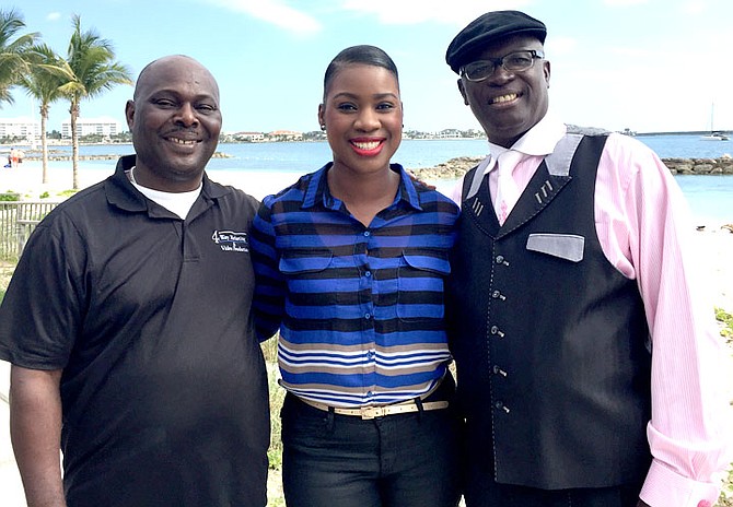Anissa Adderley, marketing executive at Aliv, poses with Winston Burrows (right), promotion manager for 4 Way Marketing and the Rev. Dr. Philip McPhee, consultant for regattas in the Ministry of Agriculture and Marine Resources.