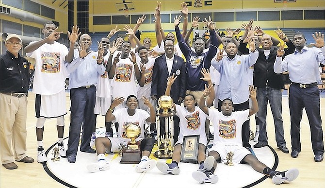 CHAMPIONS: Tabernacle Baptist Academy Falcons celebrate after winning the 35th Hugh Campbell Basketball Classic at the Kendal Isaacs Gymnasium.