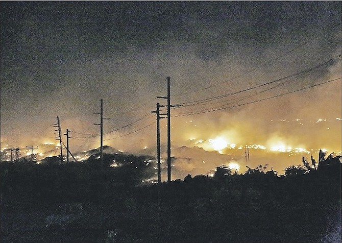 The Ongoing fire in the areas of Gladstone Road and the landfill last night. 
Photos: Terrel W. Carey/Tribune Staff