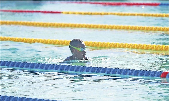 MAKING A SPLASH: A young swimmer competes in the Barracuda Swim Club/Atlantic Medical Invitational swim meet at the Betty Kelly-Kenning National Swim Complex over the weekend. 