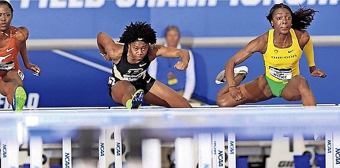 BAHAMIANS Devynne Charlton (left) and Pedrya Seymour compete in the NCAA National Indoor Track and Field Championships at Texas A&M University in College Station, Texas, March 10-11.
Photo: Walt Middleton Photography
