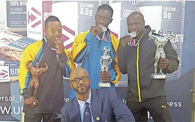 WELL DONE: Shown (l-r) are Paul ‘Mighty Mouse’ Wilson, Alberto Armbrister and Jimmy Norius with their awards. In front is coach-judge Wellington ‘Cat’ Sears.