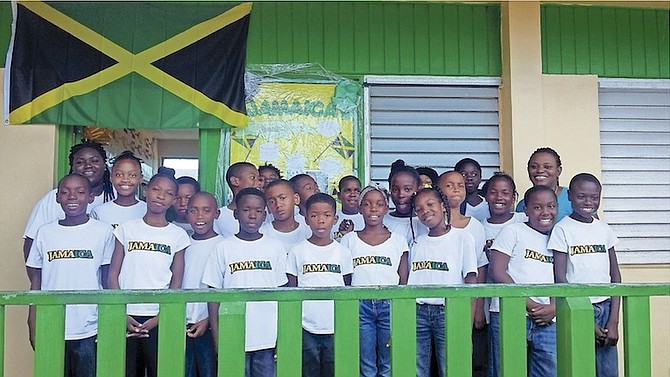 THE students of Stuart Manor Primary School in Exuma enjoyed a real Jamaica experience yesterday to commemorate Commonwealth Day, decorating their school with the Jamaican flag and the national colours of green, black and yellow.
