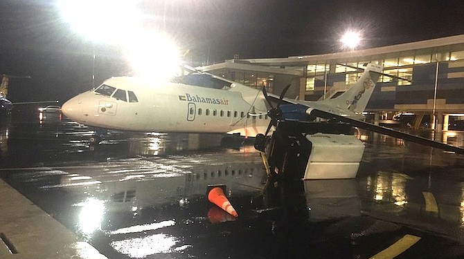 THE damaged plane at the Lynden Pindling International Airport.