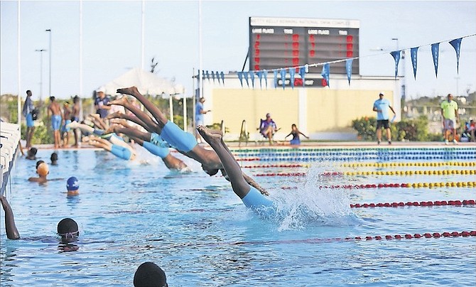 MAKING A SPLASH: Swimmers compete over the weekend in the Bahamas Swimming Federation’s Final CARIFTA Trials at the Betty Kelly Kenning National Swim Complex.
                                                                                                                                                                            Photos: Terrel W Carey/Tribune Staff