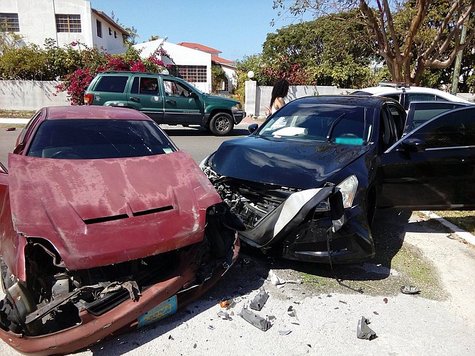 Two of the damaged cars at the scene of the accident on Yamacraw Hill Road on Sunday afternoon