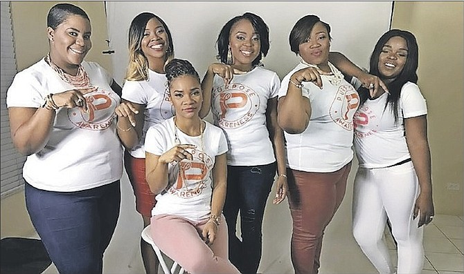 The Purpose Awareness team members, with Janiqua Armbrister (second left) and founder Antonia Lightbourne (centre).