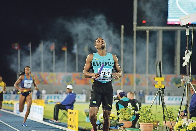 Michael Mathieu completes the anchor leg as the Bahamas wins gold in the mixed 4x400 at the IAAF World Relays in 2017.