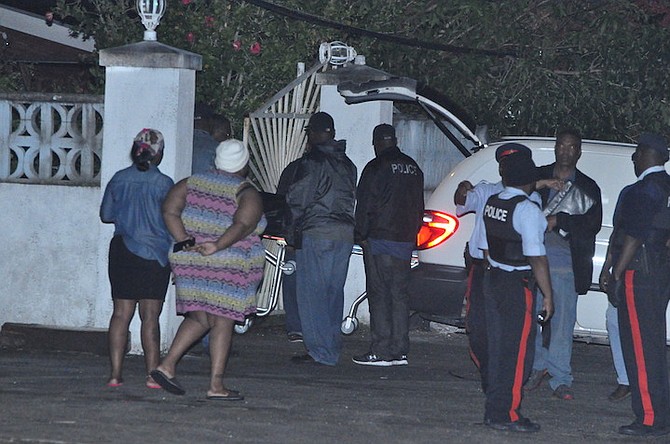 The scene on Amberjack Street, Freeport, on Sunday night after a young man had been found shot dead. Photo: Vandyke Hepburn/BIS