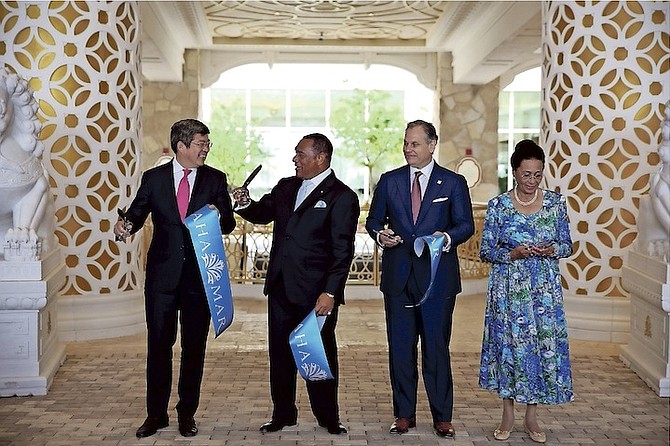 The moment Baha Mar opened on Friday, with the official ribbon cutting by the Governor General, Dame Marguerite Pindling, Prime Minister Perry Christie, Baha Mar president Graeme Davis and the president of China Construction America, Ning Yuan.
