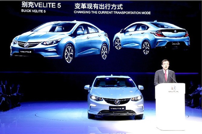 SAIC-GM president Wang Yongping announces the global launch of the Buick Velite 5, an extended range electric hybrid, during a global launch event ahead of the Shanghai Auto 2017 show in Shanghai, China, last week. (AP)