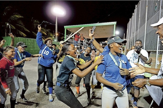 SWEET VICTORY: The Charles W Saunders Cougars senior girls celebrate their title win. 
Photo: Shawn Hanna/Tribune Staff