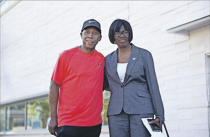 Grammy Award-winning artist Jeffrey Osborne is pictured with Mavis Darling-Hill, chairperson of the Kingdor National Parkinson Foundation, arriving at the Sir Lynden Pindling International Airport. Photo/Shawn Hanna