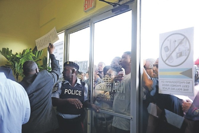 Voters outside the Kendal Isaacs gymnasium on Wednesday.