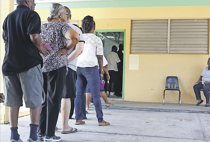 Voters queue to have their say on election day in The Bahamas. Former PLP MP Philip Galanis said party
candidates rejected by voters should be barred from contesting leadership posts at the party’s upcoming convention.


Photo: Terrel W. Carey/Tribune Staff