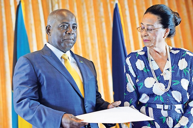 Philip "Brave" Davis is sworn in as Leader of the Opposition at Government House by Governor General Dame Marguerite Pindling. Photo: Shawn Hanna/Tribune staff