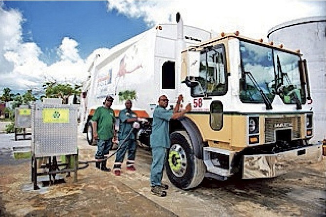 Members of the Bahamas Waste Team fill up several trucks which currently run on the use of bio-diesel.Photos: BVS Bahamas/Barefoot Marketing