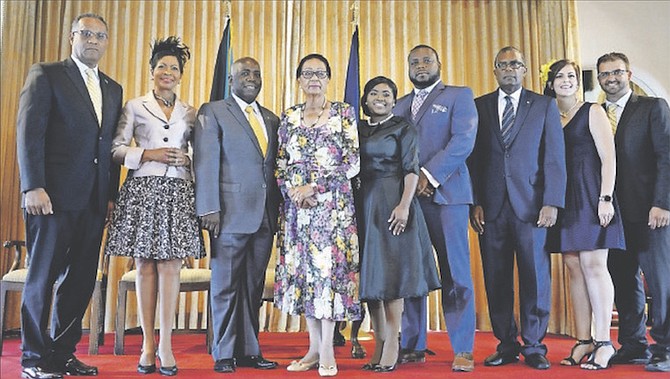 Philip Brave Davis, Opposition Leader along with his wife Anne-Marie and Governor General Dame Marguerite Pindling with the official Senators of the Opposition and their families after being sworn in yesterday at Government House. Photos: Shawn Hanna/Tribune Staff