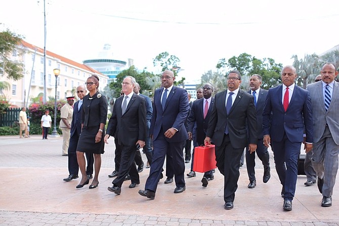 The Cabinet make their way to Parliament for the budget communication. Photo: Terrel W. Carey/Tribune Staff